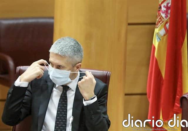 AUGC cuestiona la renovación de Marlaska por la causa judicial que tiene abierta el nuevo 'número 3' de la Guardia Civil El ministro de Interior, Fernando Grande-Marlaska, se coloca la mascarilla durante su comparecencia ante la Comisión de Interior en el Senado