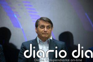 Bolsonaro avisa a los brasileños de que él se exime de cualquier efecto secundario de la vacuna