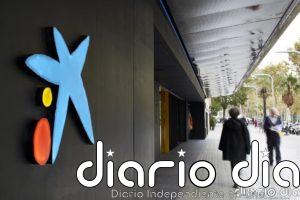 CaixaBank ganó 1.381 millones en 2020, un 19% menos, tras provisionar 1