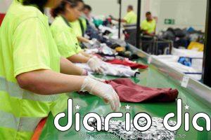 Moda-re, la cooperativa de Cáritas que convierte ropa usada en empleo