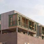 Pisos de alquiler para jóvenes sobre los tejados de los edificios