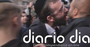 Un grupo de judíos gritan a periodistas de Al Jazzera que se vayan de Londres