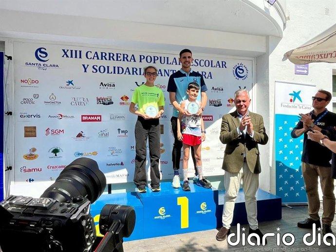 Un millar de vecinos llena de solidaridad Sevilla con la XIII Carrera Popular, Escolar y Solidaria de Santa Clara