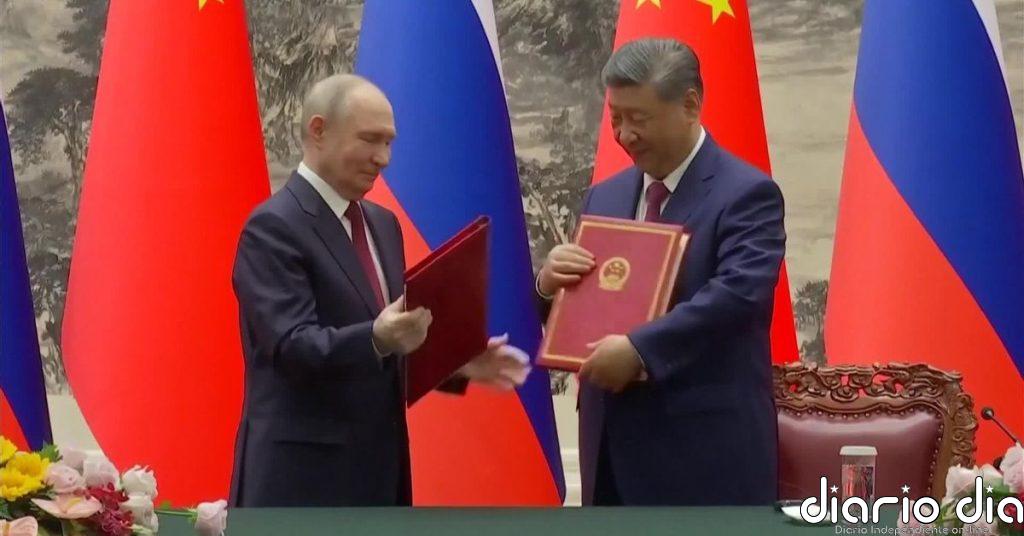 Putin recibe en China el mismo protocolo que Trump